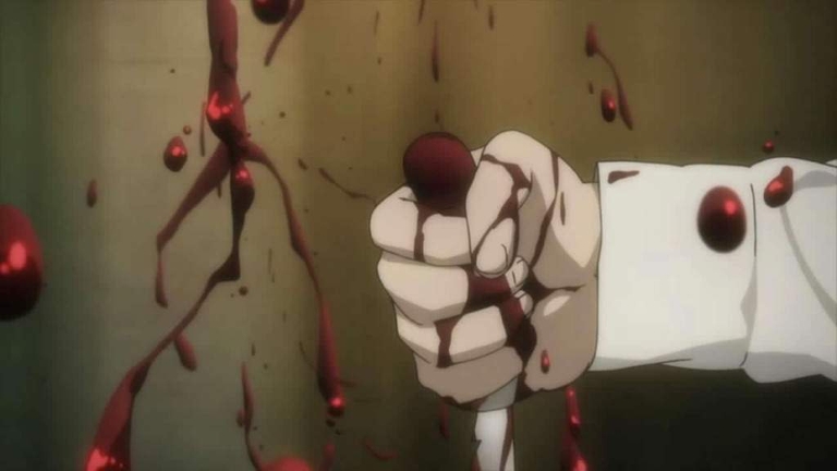 A hand covered in blood