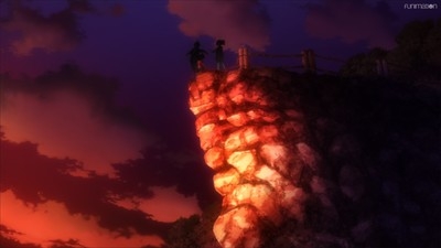 Two figures stand on a cliff at sunset in a dramatic scene from Talentless Nana.