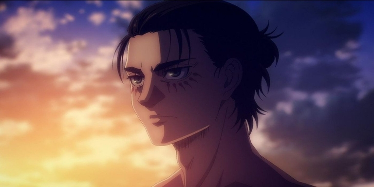 Eren Yeager with his signature Attack Titan marks under his eyes, looking determined during a sunset scene in Attack on Titan The Final Season.