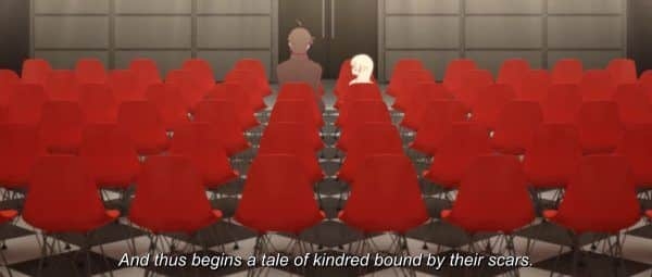 Araragi and Kiss-Shot seated in an empty auditorium