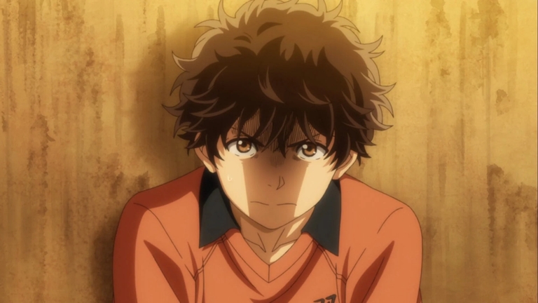 Ashito Aoi shows a frustrated expression while leaning against a wall in the anime Ao Ashi.