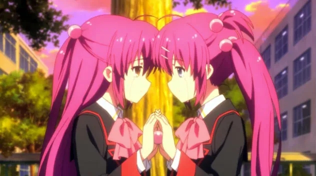 Twin sisters with pink hair facing each other emotionally