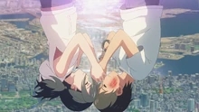 Hina and Hodaka holding hands upside down