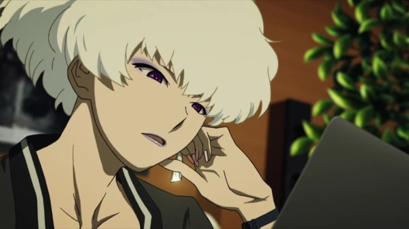 Five analyzing data on her laptop